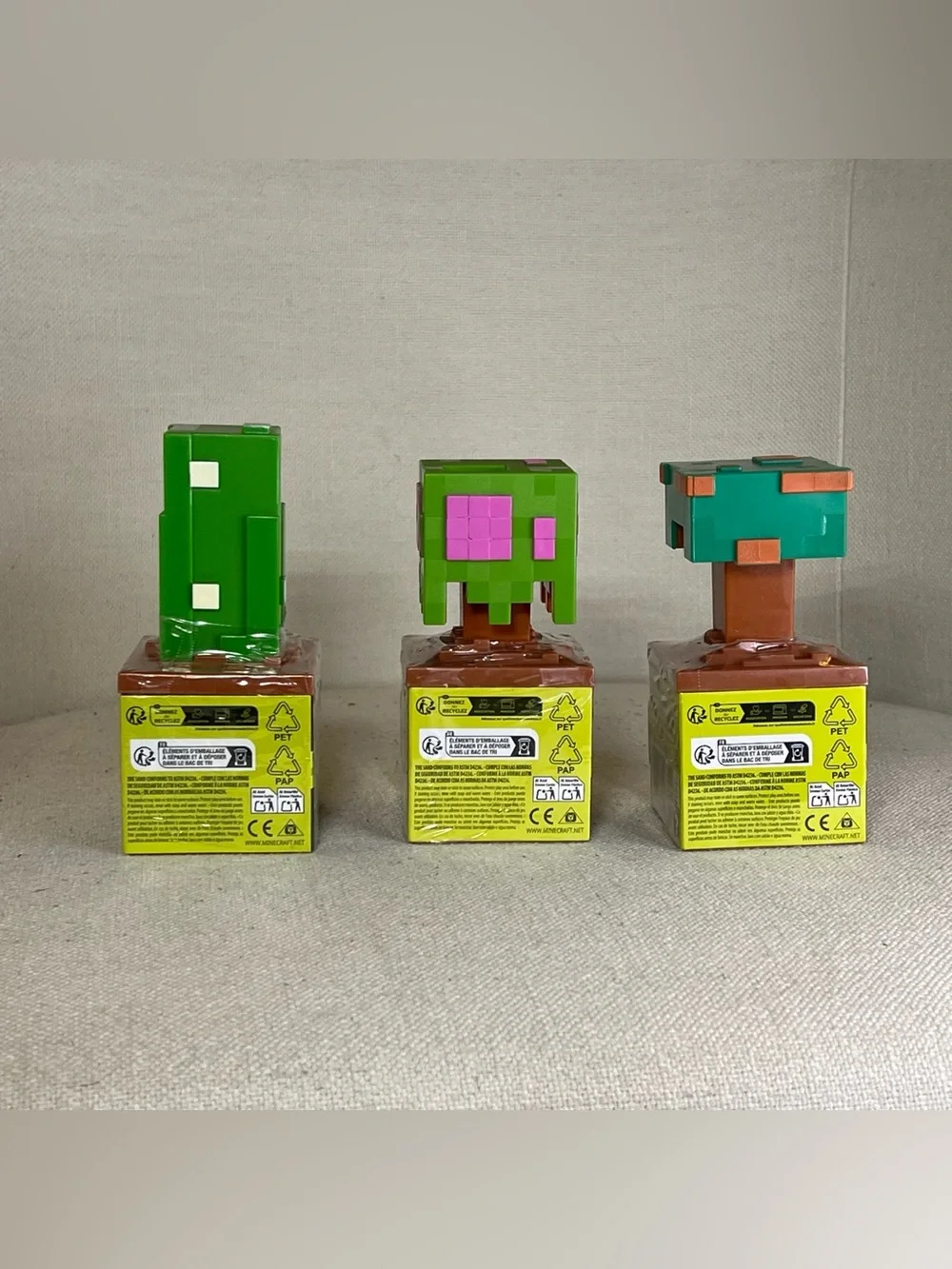 Mattel Minecraft Bloom Blocks Mini Figures in Bright Green, Brown, Teal, Pink